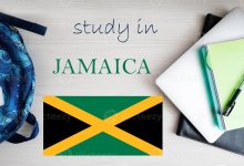 study in jamaica background with notepad laptop and backpack education concept photo