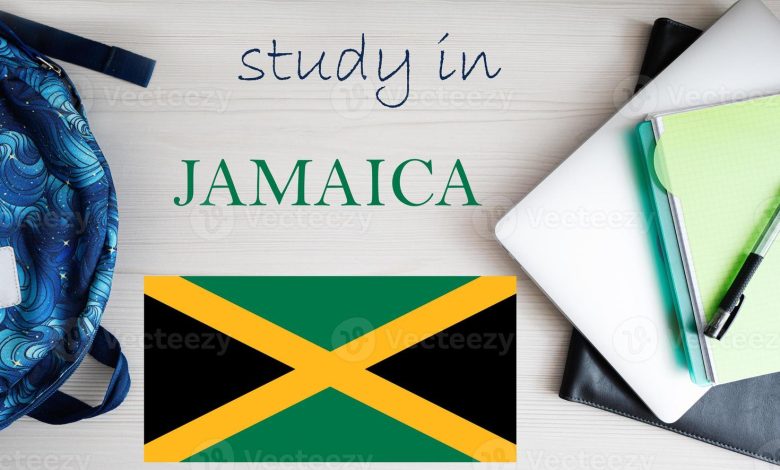 study in jamaica background with notepad laptop and backpack education concept photo